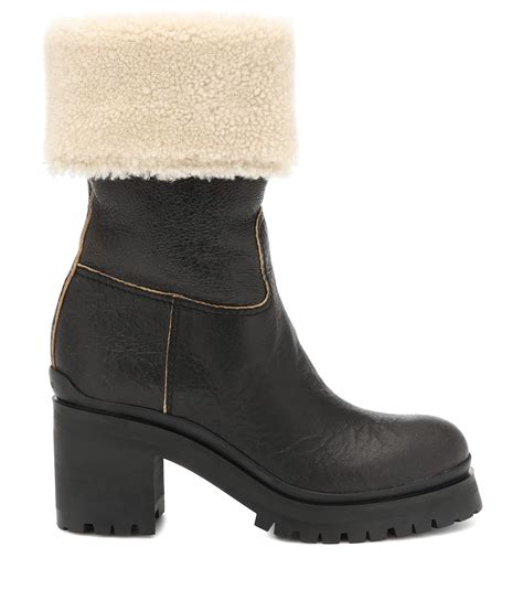 miu miu shearling trimmed boots|best shearling boots.